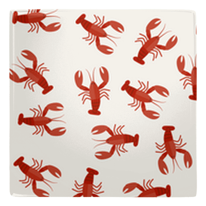 Fun kitchen magnets featuring adorable crawfish design on a fridge surface.