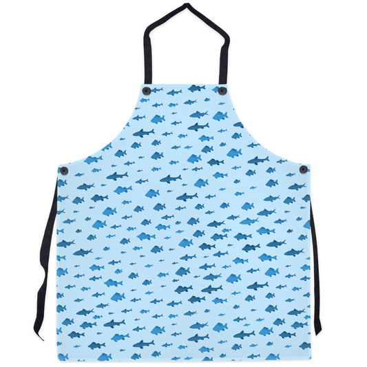 Blue apron with playful fish and shark design, perfect for ocean lovers and cooking enthusiasts.