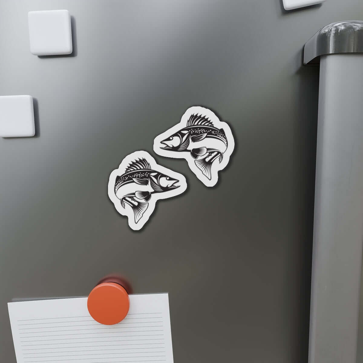 Walleye fish shaped magnets on fridge, perfect for fish décor and fishing fans.