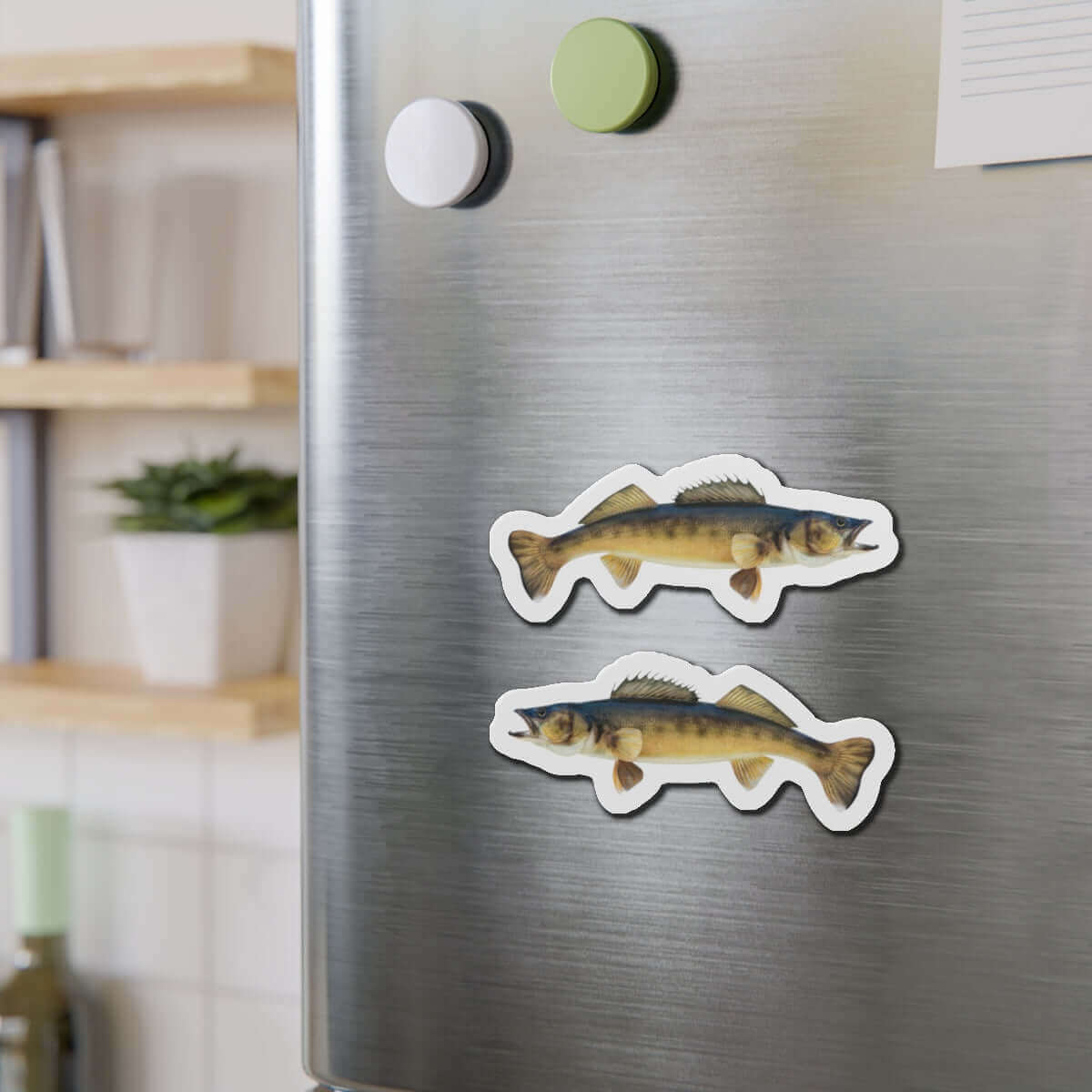 Walleye fish shaped magnets on a fridge adding natural flair, perfect for fishing fans and fun kitchen décor.