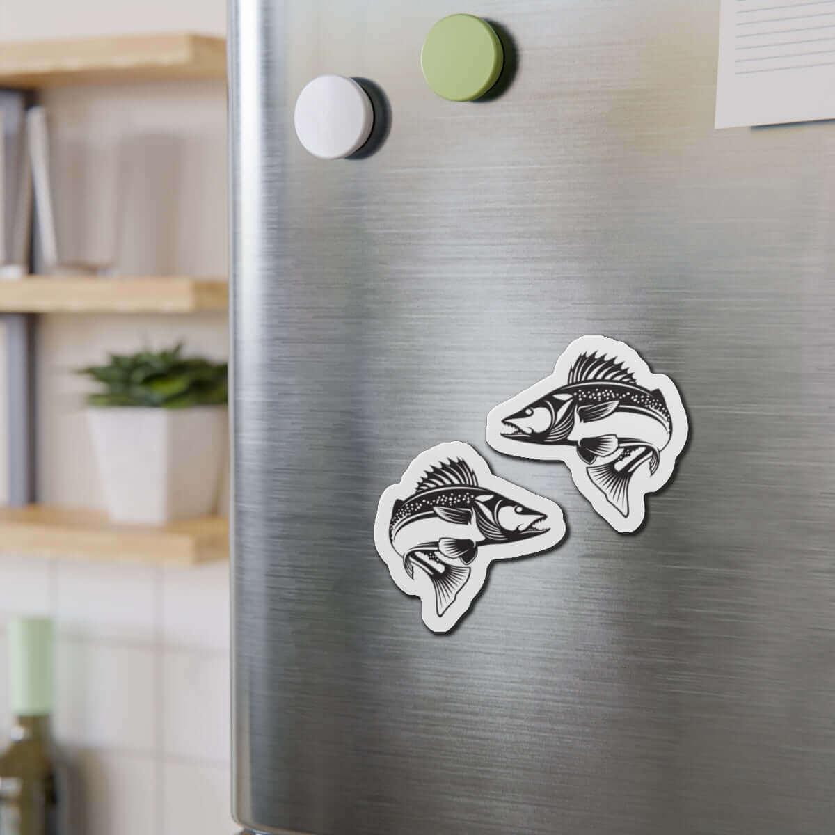 Walleye fish shaped magnets on refrigerator adding fun fish décor to the kitchen.