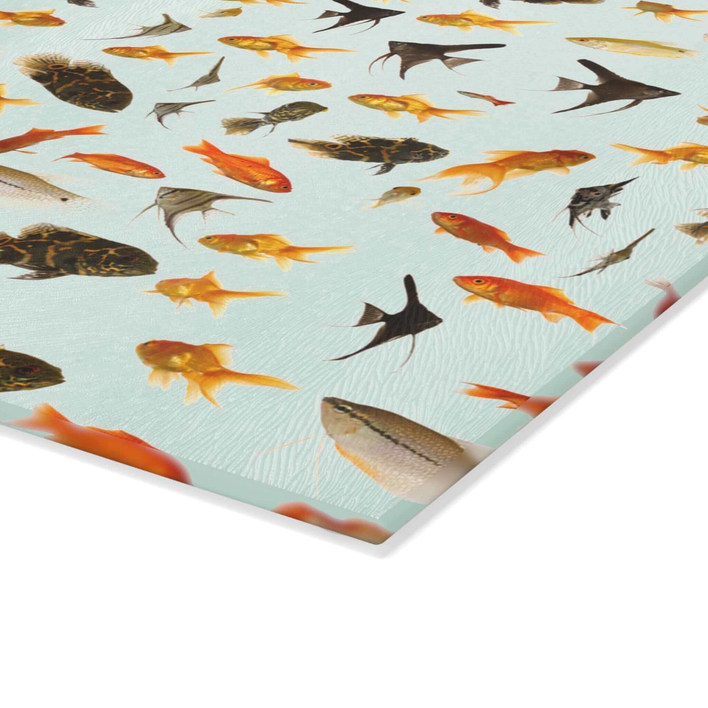 Vibrant aquarium fish design on glass cutting board for kitchen decor