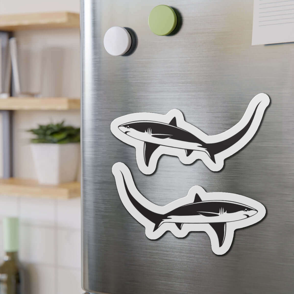 Thresher Shark magnets on fridge, showcasing fish décor with fun kitchen flair.