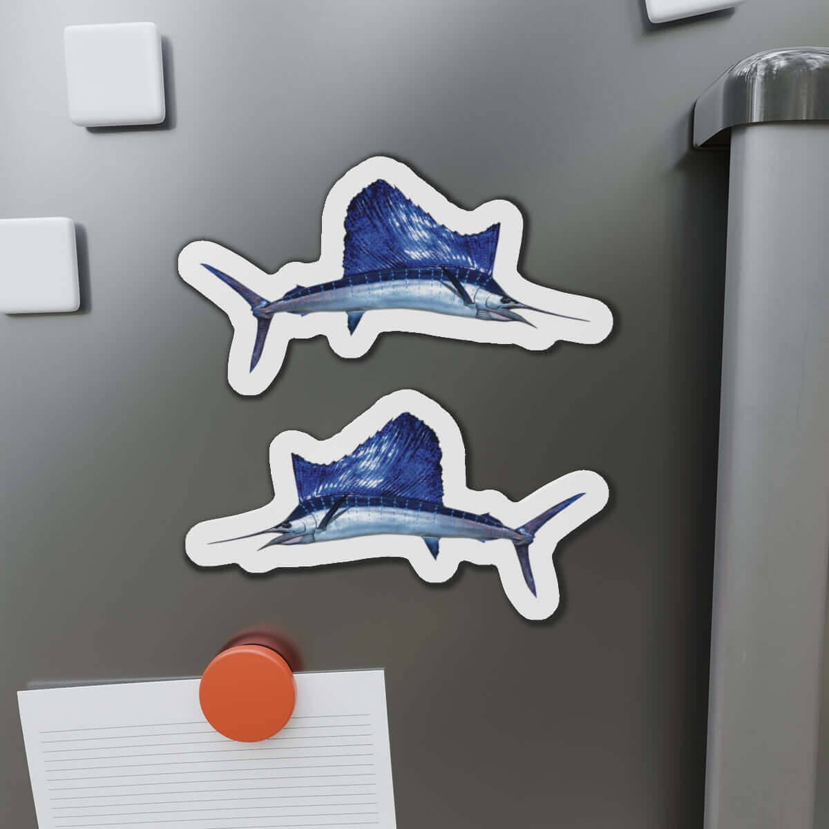 Sailfish shaped magnets on refrigerator, featuring fish décor for fishing fans, ideal as fun fridge magnets.