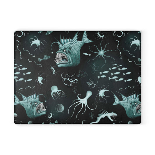 Anglerfish glass cutting board with marine life design and deep-sea creatures.