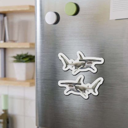 Hammerhead Shark fish magnets on a fridge for fun kitchen décor.