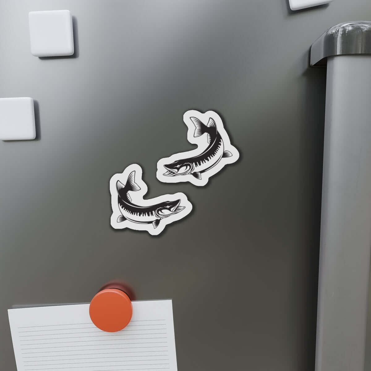 Muskie fish shaped magnets on fridge, showcasing natural flair in fun kitchen décor.