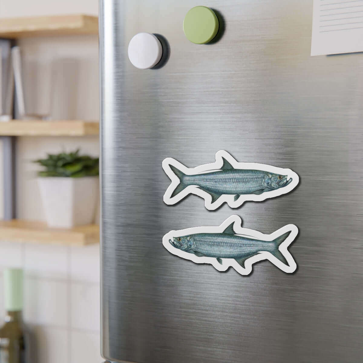 Tarpon fish-shaped magnets on fridge add natural flair and fun décor to kitchen.