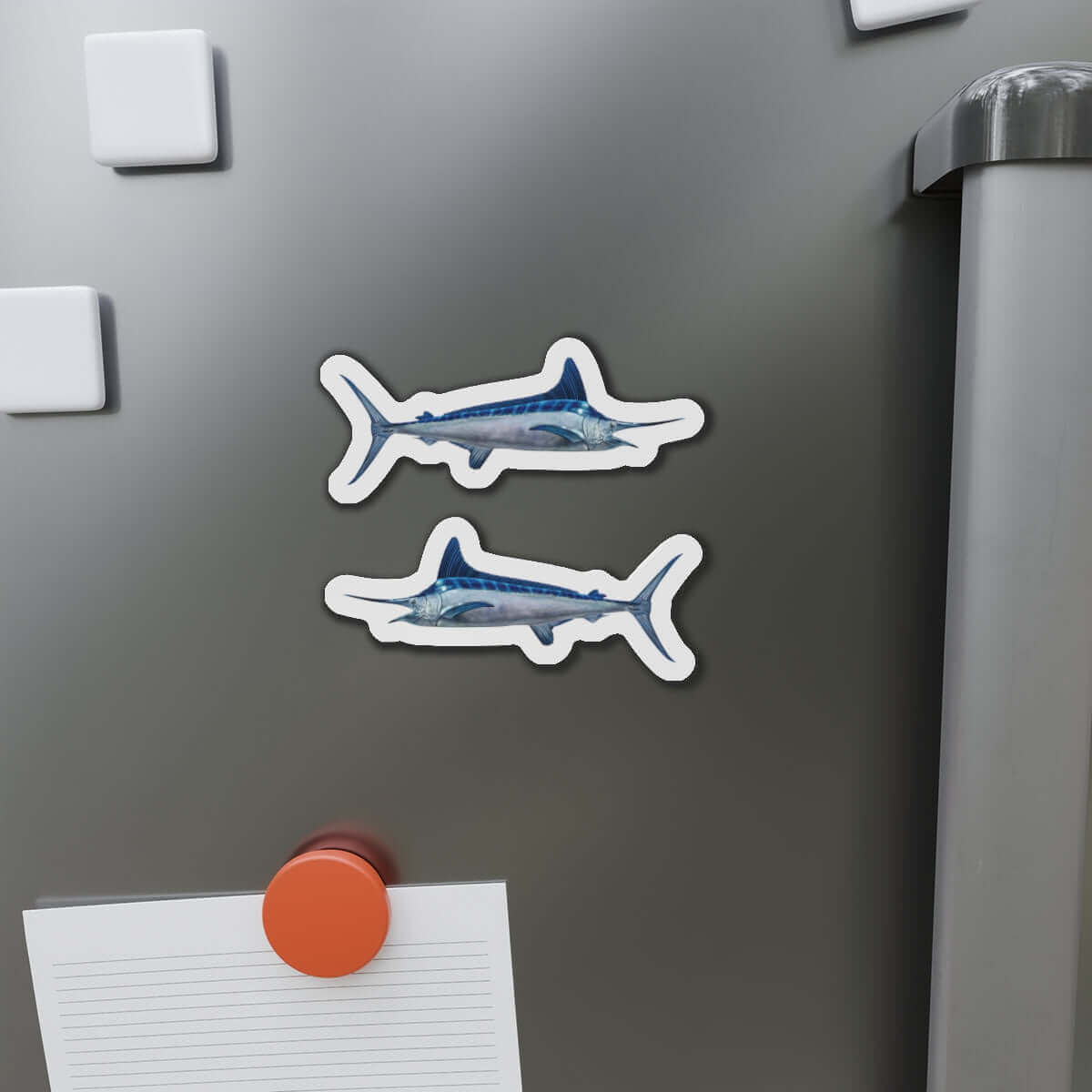 White Marlin fish shaped magnets on a refrigerator, perfect for fish décor and fishing fans who enjoy fun kitchen magnets.