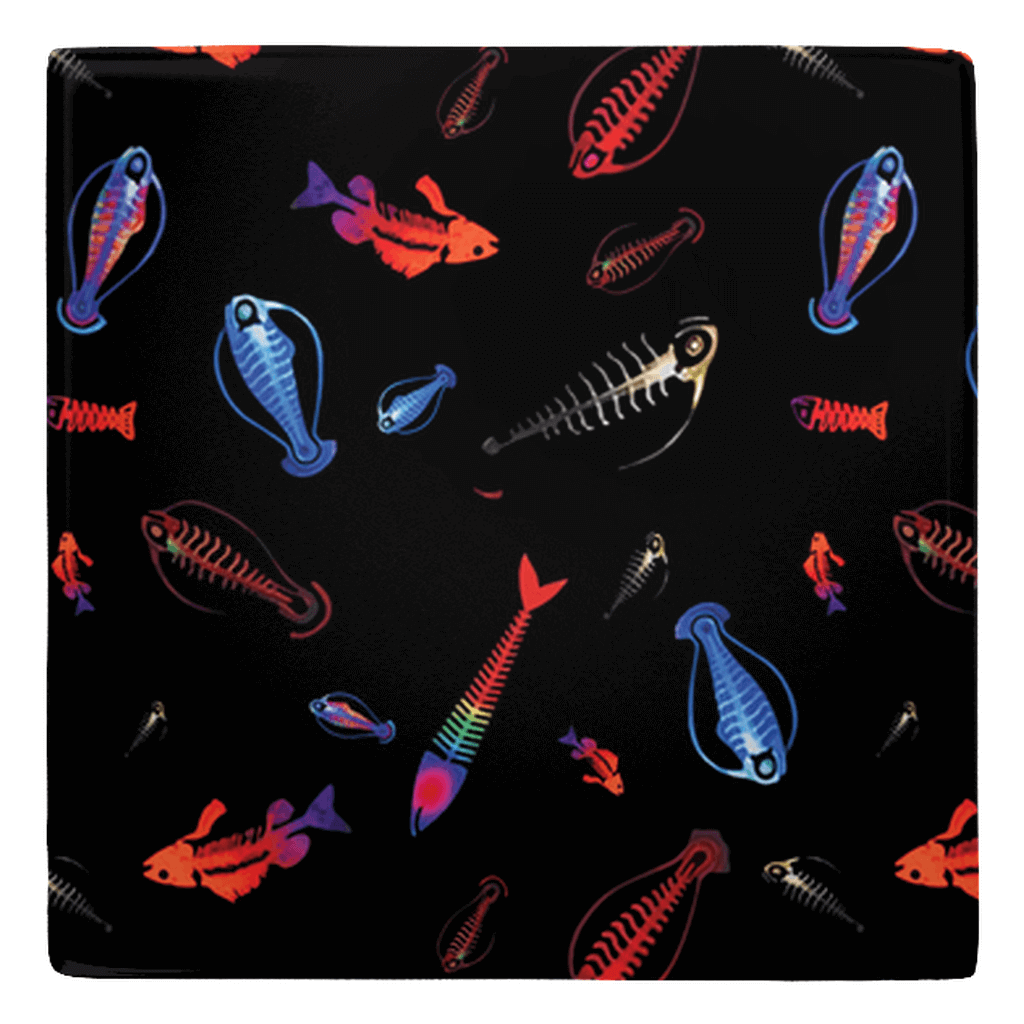 Colorful plankton deep sea fish shaped magnets for fun fish décor on a sleek black background.