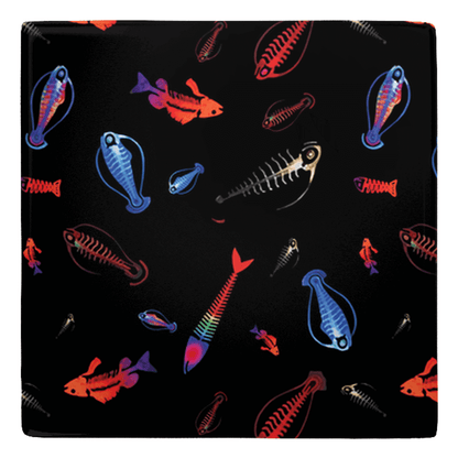 Colorful plankton deep sea fish shaped magnets for fun fish décor on a sleek black background.