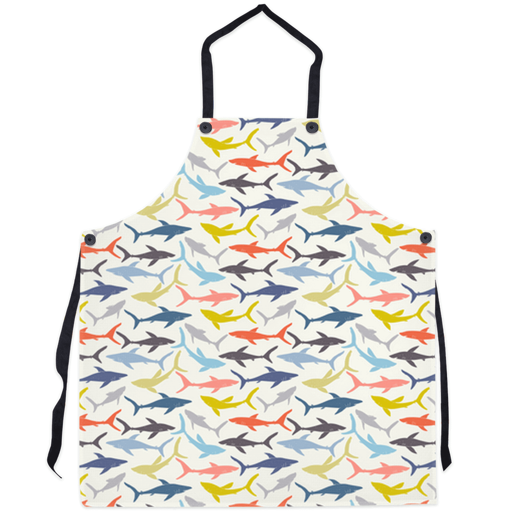 Colorful shark pattern apron for ocean lovers, featuring vibrant shark designs on a white background. Perfect for cooking and entertaining.