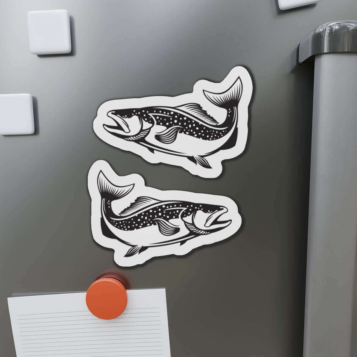 Brown Trout fish shaped magnets on refrigerator for fun kitchen décor.