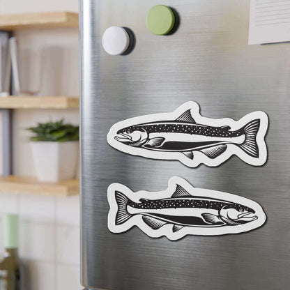 Chinook Salmon fish shaped magnets on a fridge adding fun kitchen décor for fishing enthusiasts.