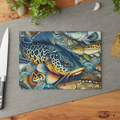 Vibrant Catfish Glass Cutting Board on kitchen counter with knife, featuring detailed fish design, perfect for food prep and kitchen decor