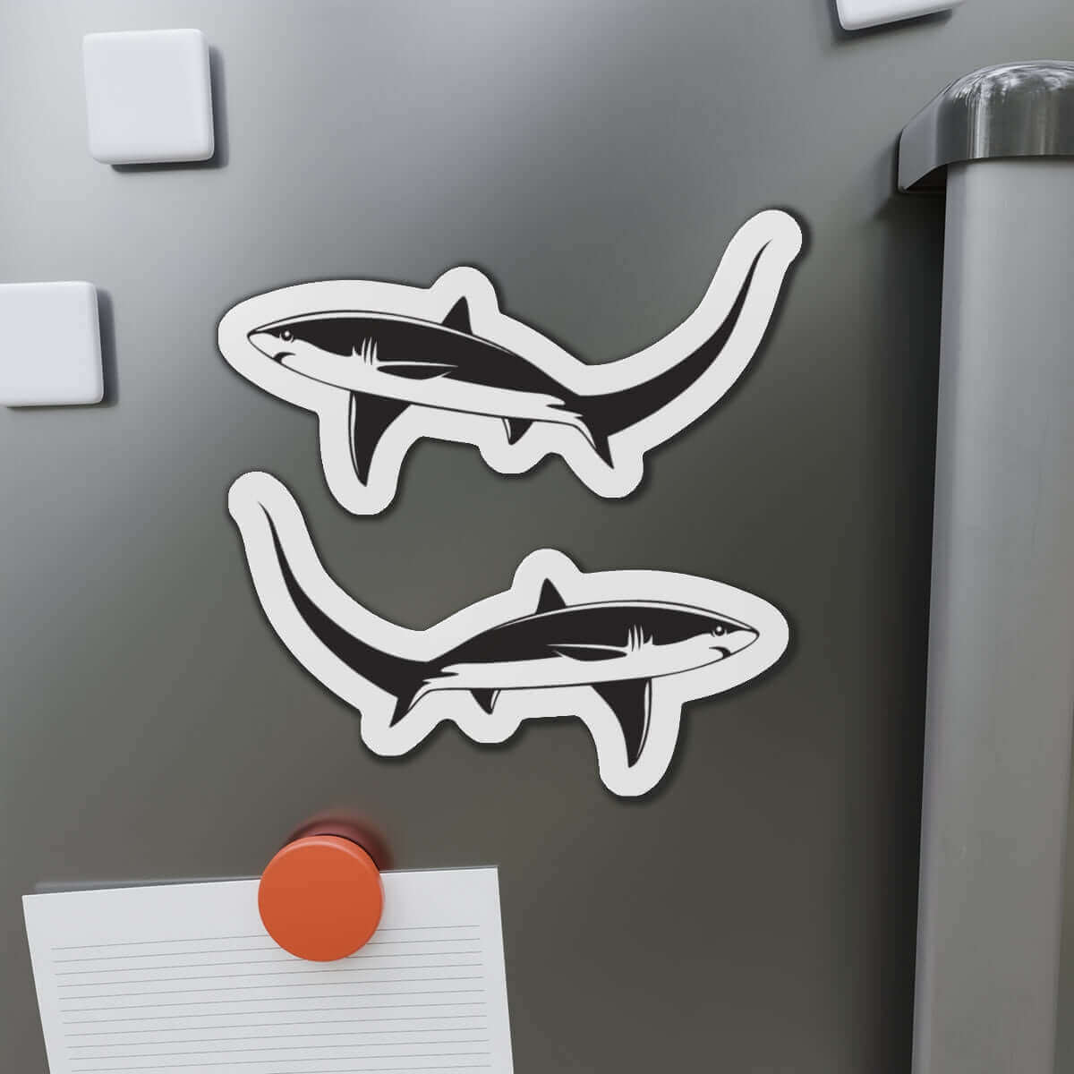 Thresher Shark fish shaped magnets on refrigerator for fun kitchen décor.