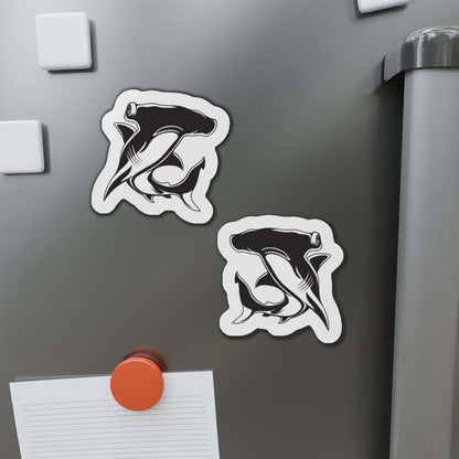 Hammerhead Shark-shaped fridge magnets on a gray surface, perfect for fish décor enthusiasts and fun kitchen magnets collection.