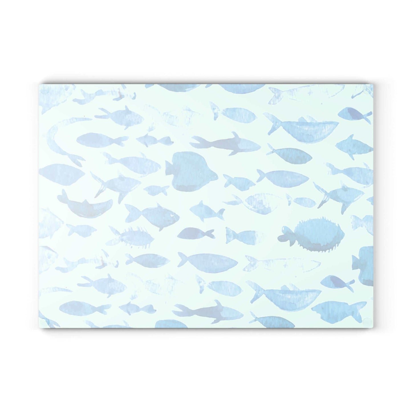 Blue watercolor fish design on a glass cutting board, perfect for kitchen decor and food prep