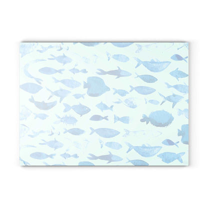 Blue watercolor fish design on a glass cutting board, perfect for kitchen decor and food prep