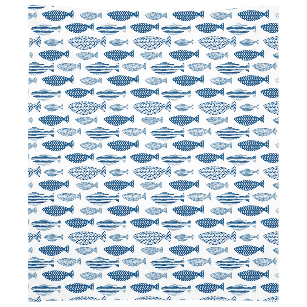 Fish decor wall tapestry with blue patterned fish on white background, perfect for adding aquatic style to any room.