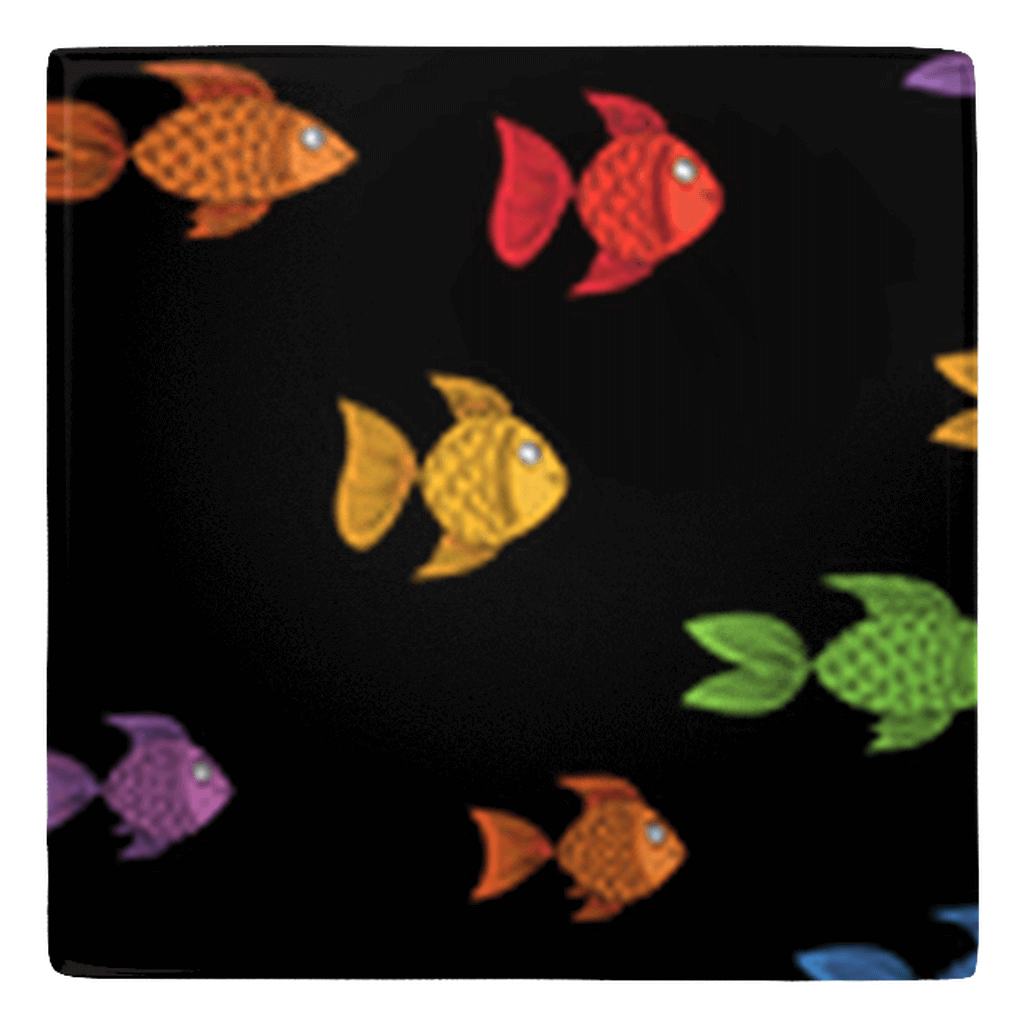 Colorful fish shaped magnets swimming on black background for fun fridge décor.