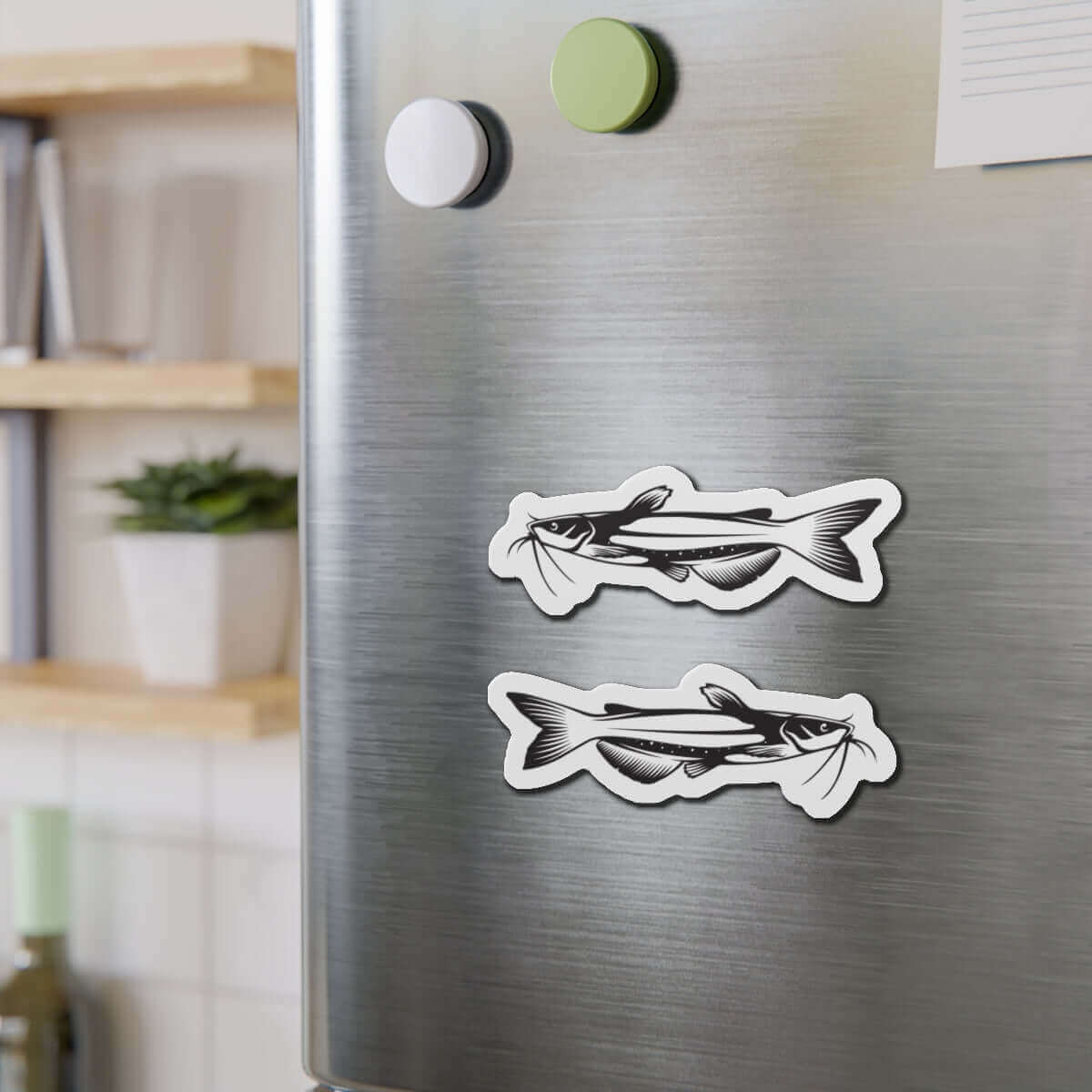 Channel Catfish magnets on a fridge, showcasing left and right-facing designs for fun fish décor and fishing fridge magnet enthusiasts.