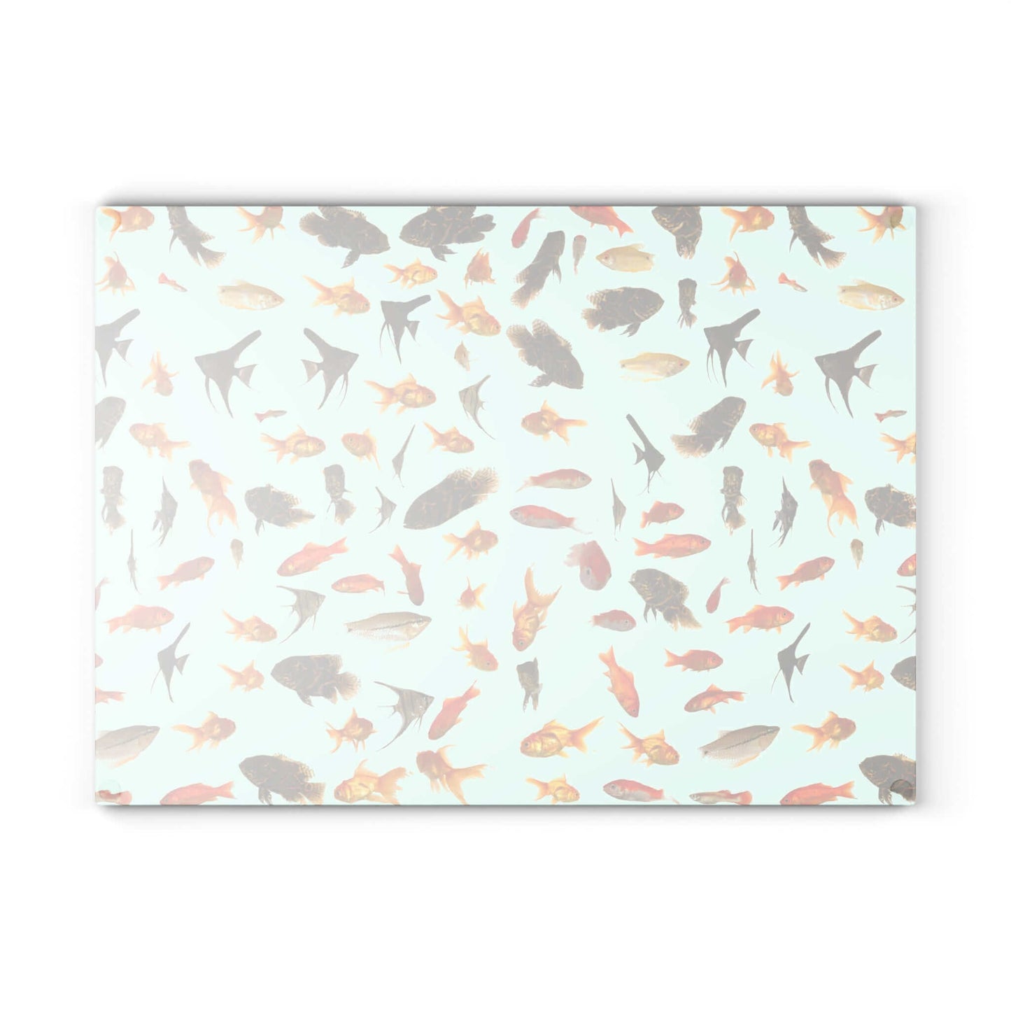 Vibrant fish design on a tempered glass cutting board for kitchen decor and food prep