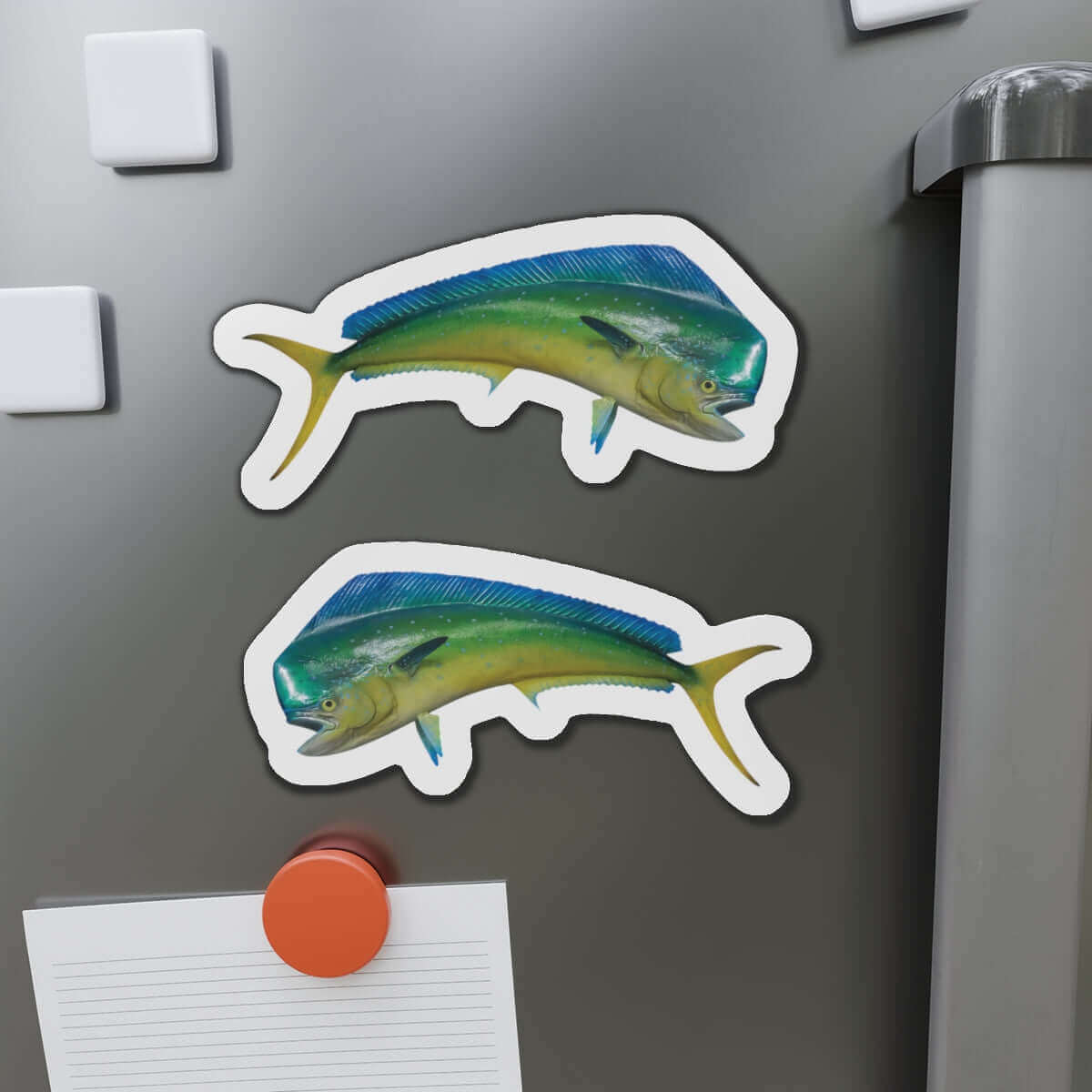 Mahi-Mahi fish shaped magnets on a refrigerator, perfect for fish décor lovers and fun kitchen magnet enthusiasts.