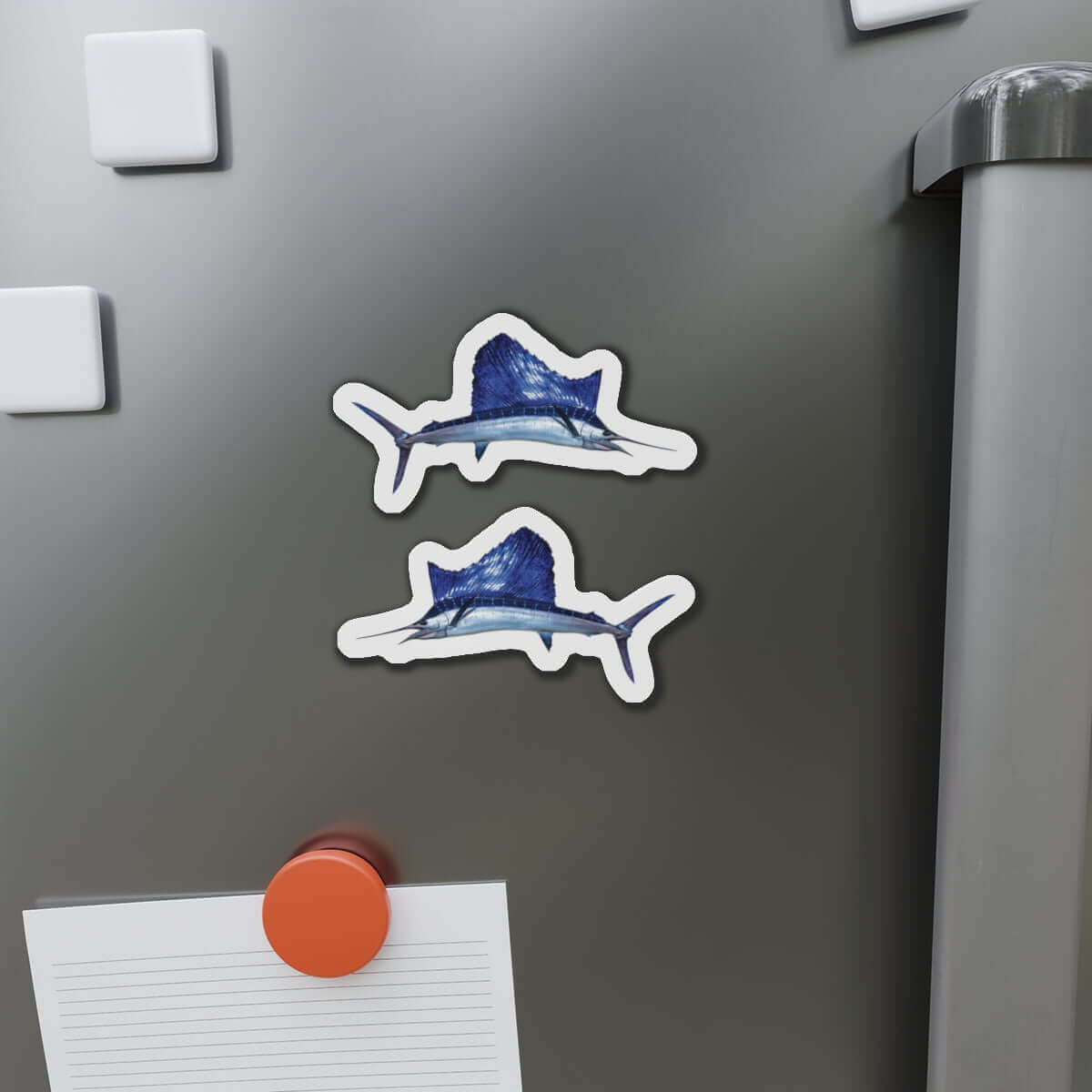 Sailfish shaped magnets on fridge, adding a touch of fish décor for fishing enthusiasts and lovers of fun fridge magnets.