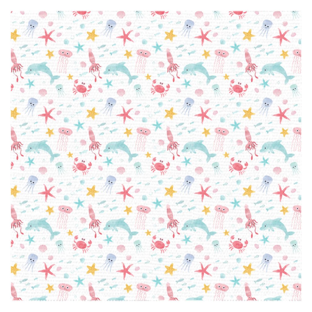 Watercolor ocean jellyfish tablecloth with playful aquatic design featuring jellyfish, starfish, crabs, and dolphins.