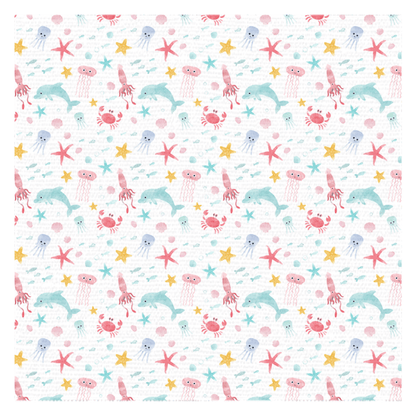 Watercolor ocean jellyfish tablecloth with playful aquatic design featuring jellyfish, starfish, crabs, and dolphins.