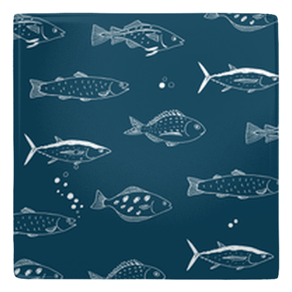 Fish décor metal magnet with sealife sketch pattern on a dark blue background.