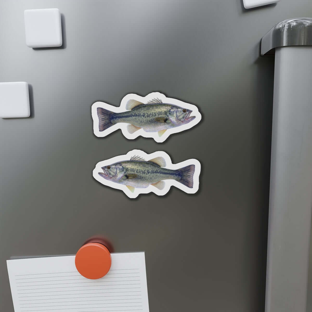 Largemouth Bass fish shaped magnets on a fridge, perfect for fish décor and fishing fans.