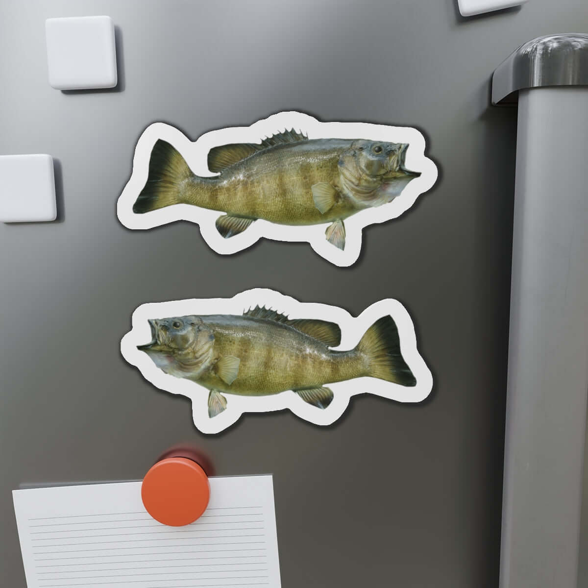 Smallmouth Bass fish-shaped magnets on a fridge, perfect for fishing fans and adding a fun kitchen flair.