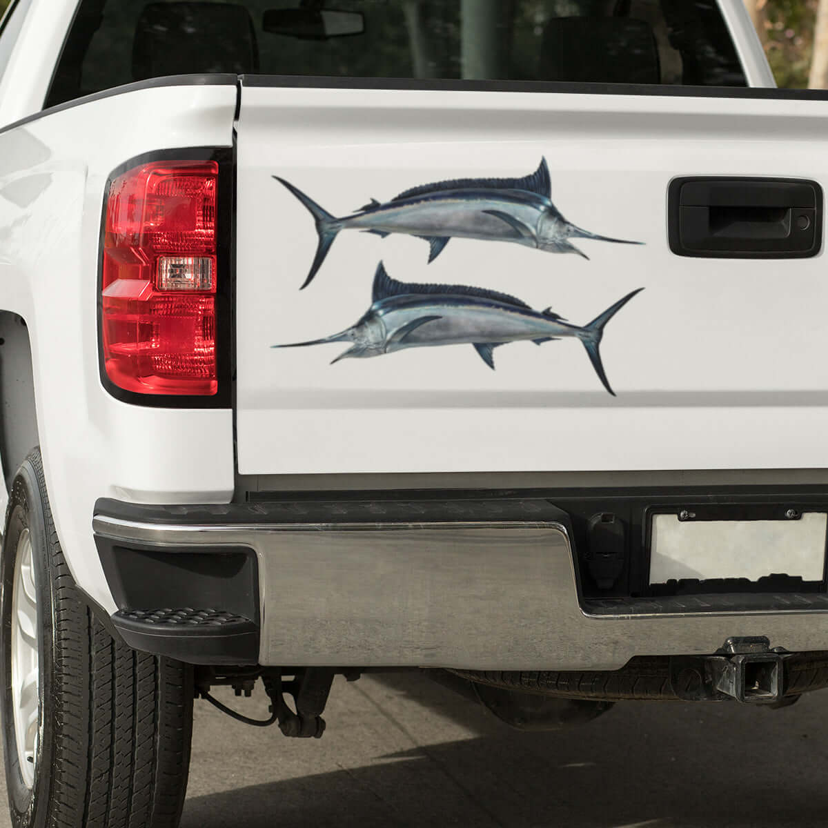 Large Black Marlin decals on a white truck.