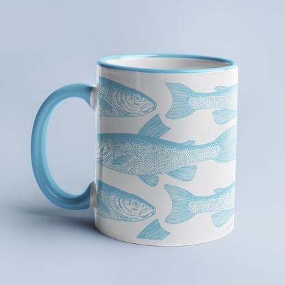 Blue Mullet Fish mug on a light blue background, with a light blue handle and rim.