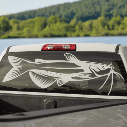 Channel Catfish window large decal on a truck, parked at a river.