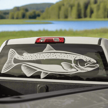 Chinook Salmon decals on a pickup truck by a river.