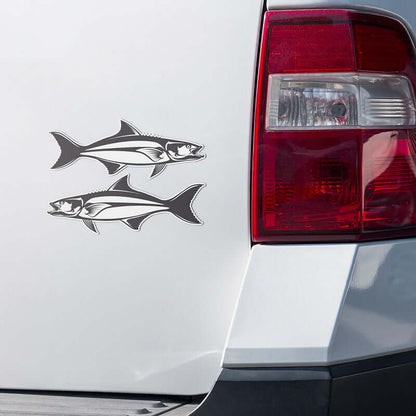 Two weather-resistant cobia fish stickers applied to the back of a car, perfect for fishing enthusiasts.