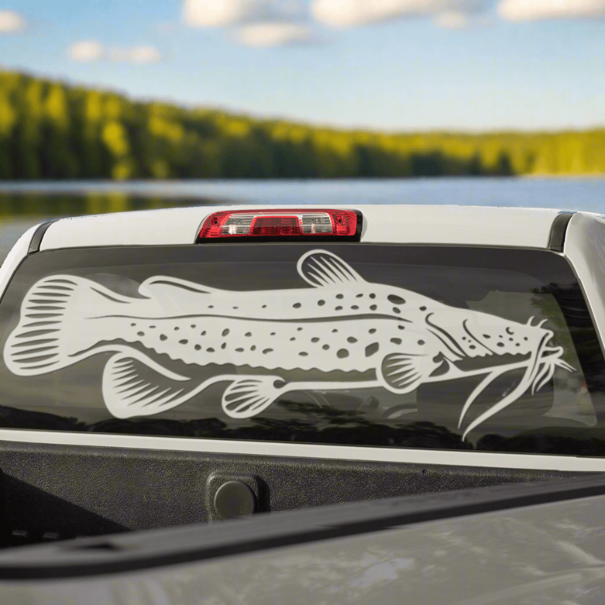 Large Flathead Catfish decals on a truck window.