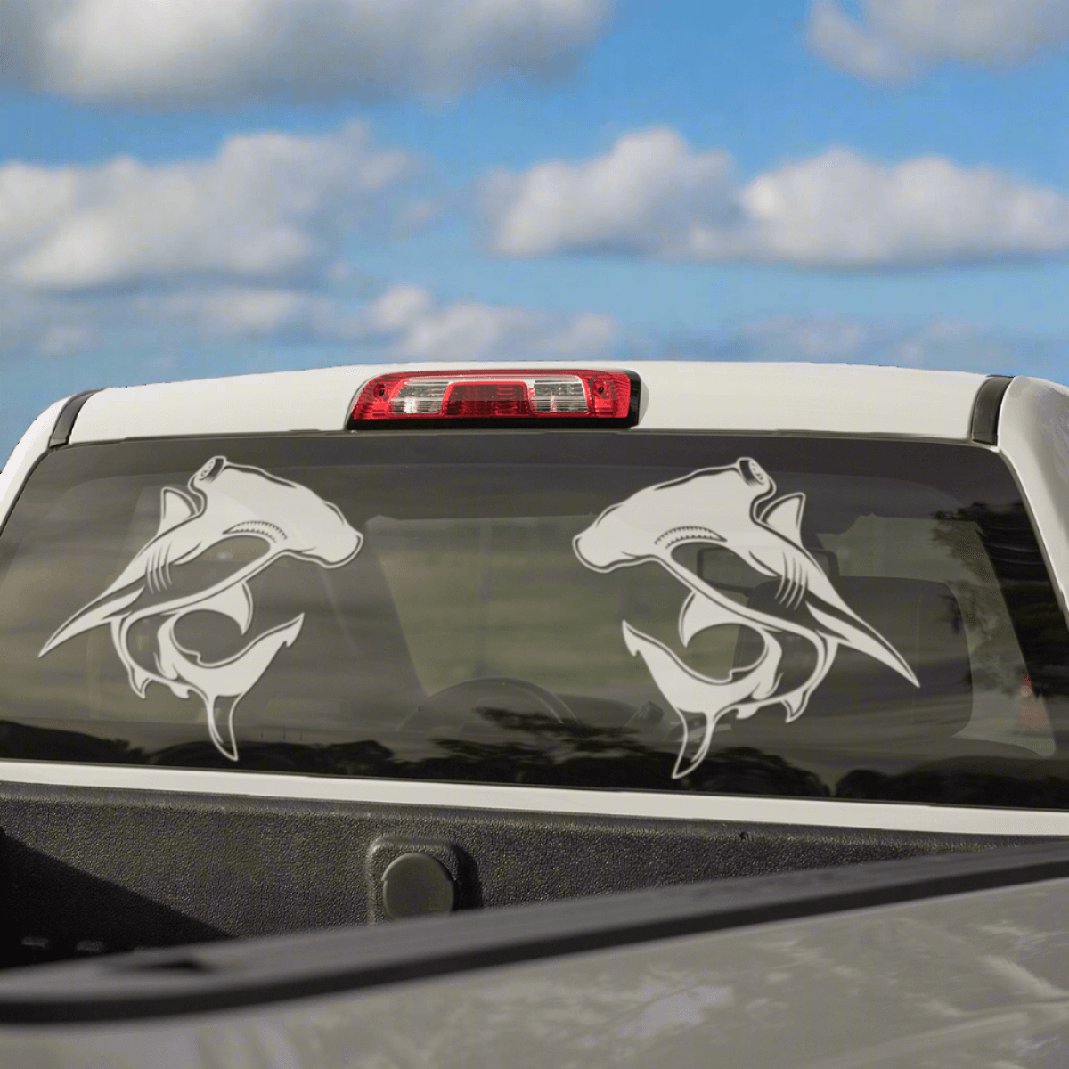 White hammerhead shark decals on truck window, perfect fishing stickers for cars.