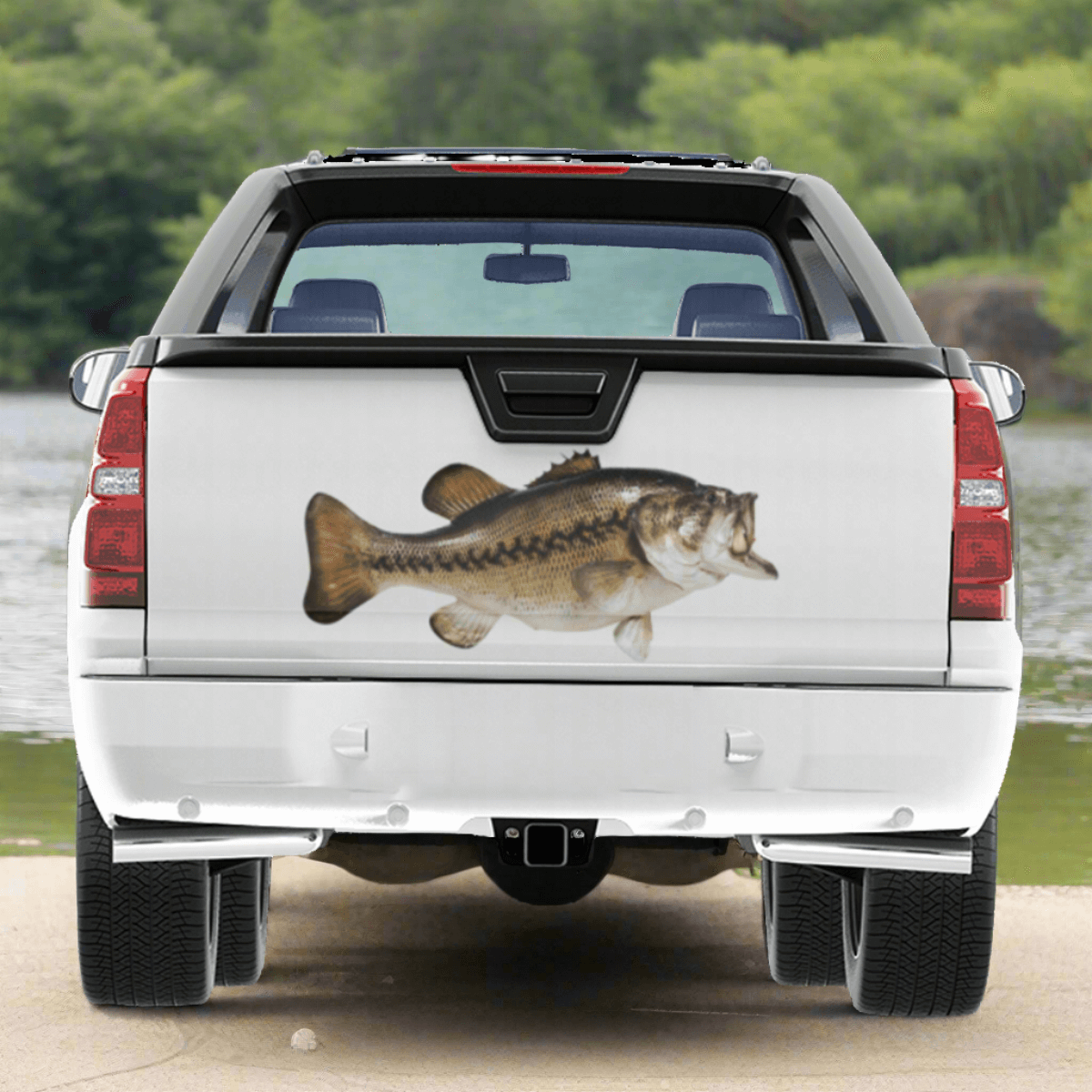 Largemouth Bass large decals on a pickup truck near a freshwater river.