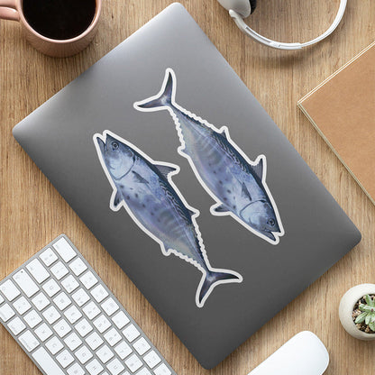 Little Tunny Tuna stickers on a laptop.