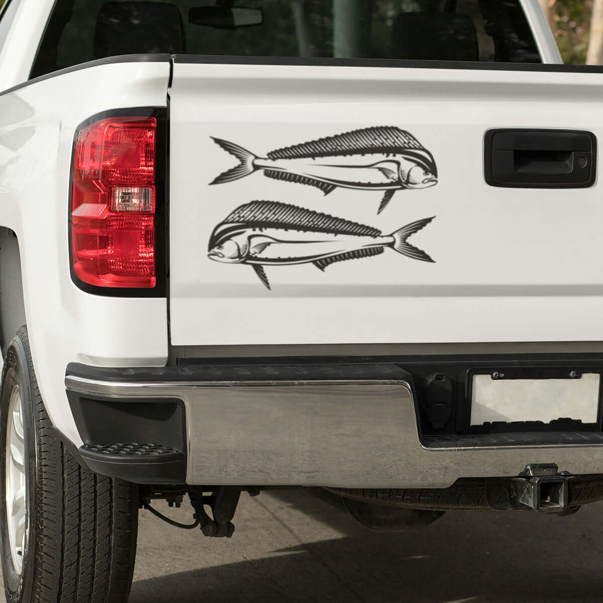 Mahi Mahi decals on truck tailgate, custom fish stickers for trucks, marine-grade vinyl, black design, perfect for fishing enthusiasts.