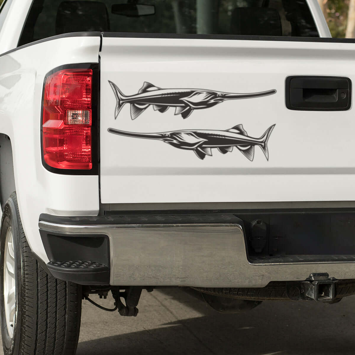 Large Paddlefish decals on a pickup truck.