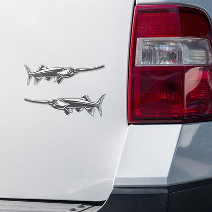 Paddlefish stickers on a white truck.