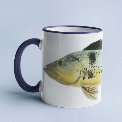 White coffee mug featuring a realistic fish illustration on a light blue background.