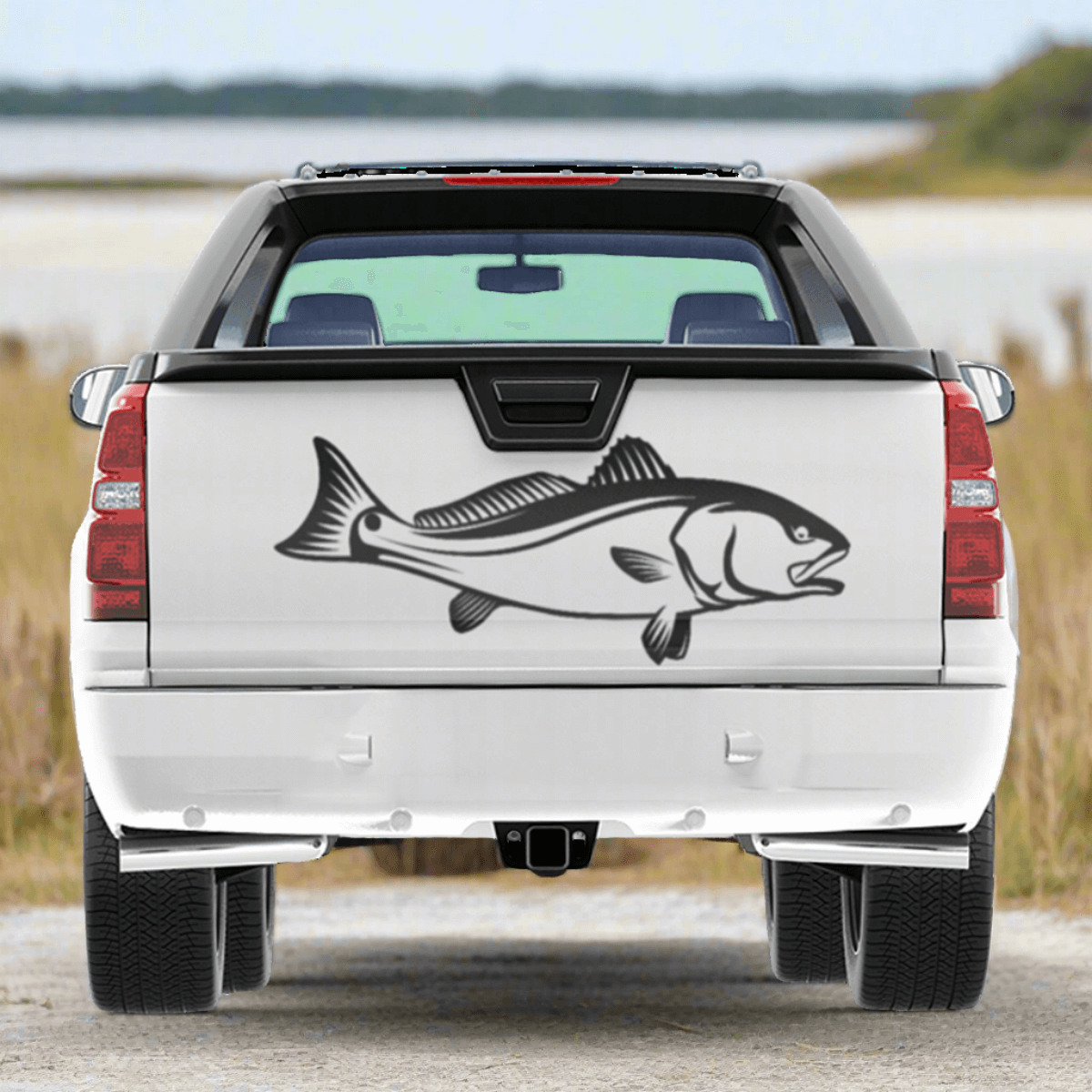 Customizable Red Drum fish decal on truck, available in sizes 14"-70", perfect for car fishing decals, weatherproof and marine-grade.