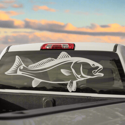 White Redfish decal on truck window showcasing fishing decals for trucks