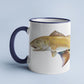 Red Drum accent mug with dark blue handle on light blue background.